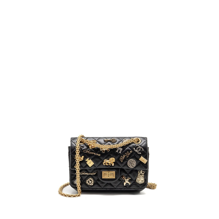 CHANEL MINI 2.55 REISSUE FLAP BAG LUCKY CHARMS AGED CALFSKIN BLACK GHW